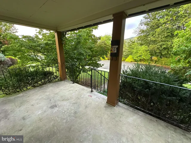 a view of a yard with porch