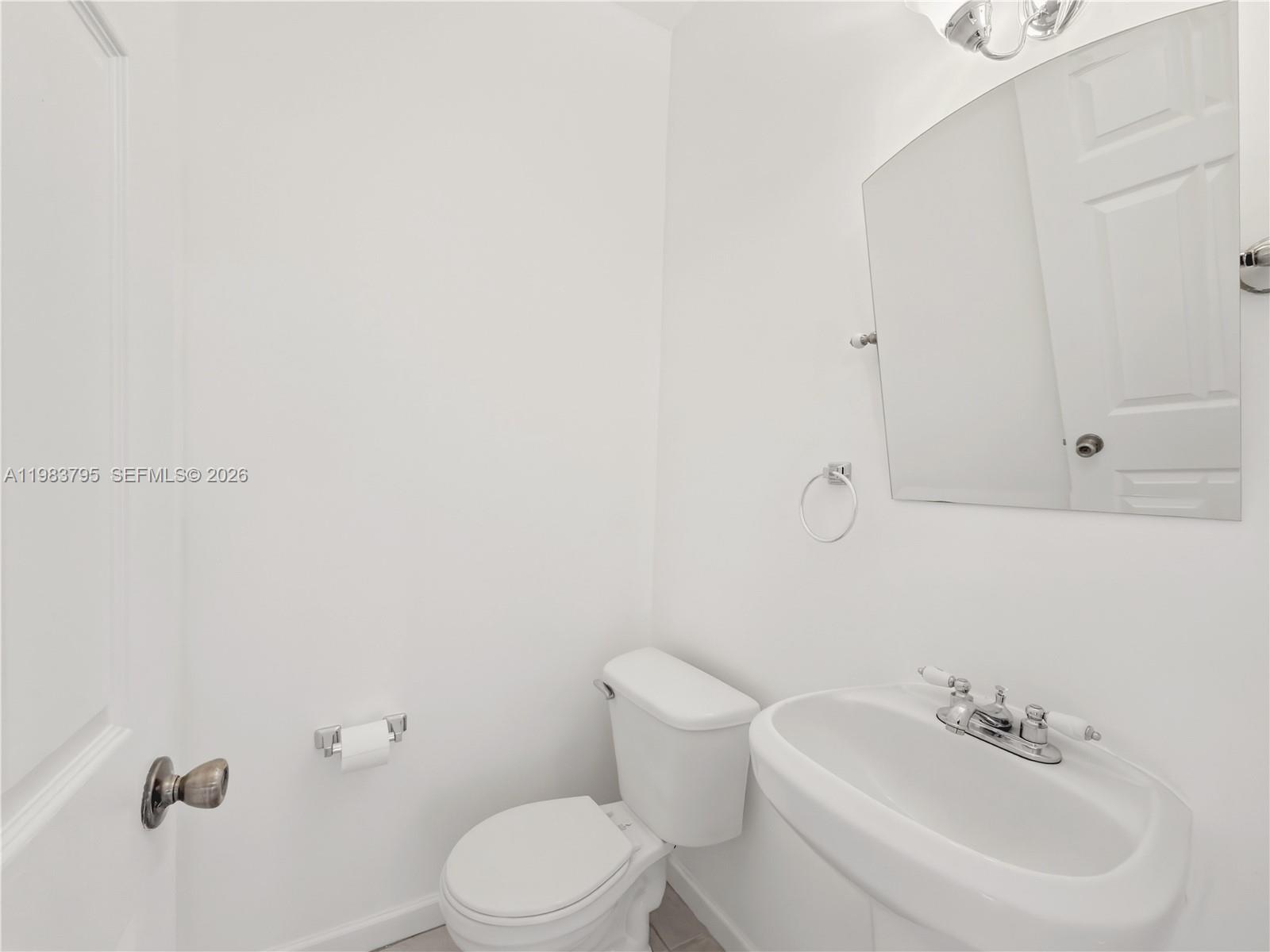 8501 Southwest 128th Street Miami, FL 33156 - Photo 20 of 28 half bath off kitchen