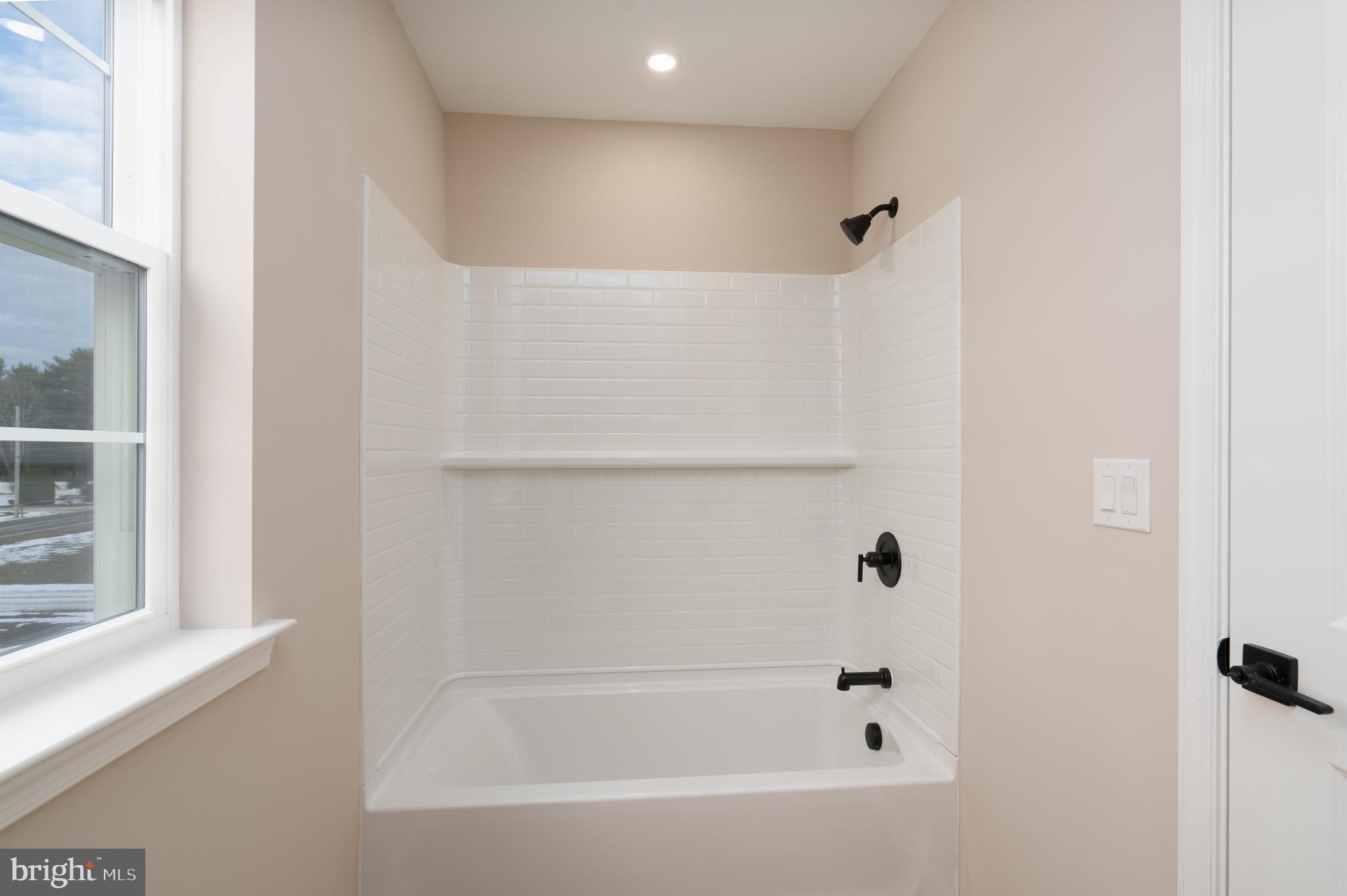 1162 South Spring Road Vineland, NJ 08361 - Photo 36 of 57 a bathroom with a bathtub