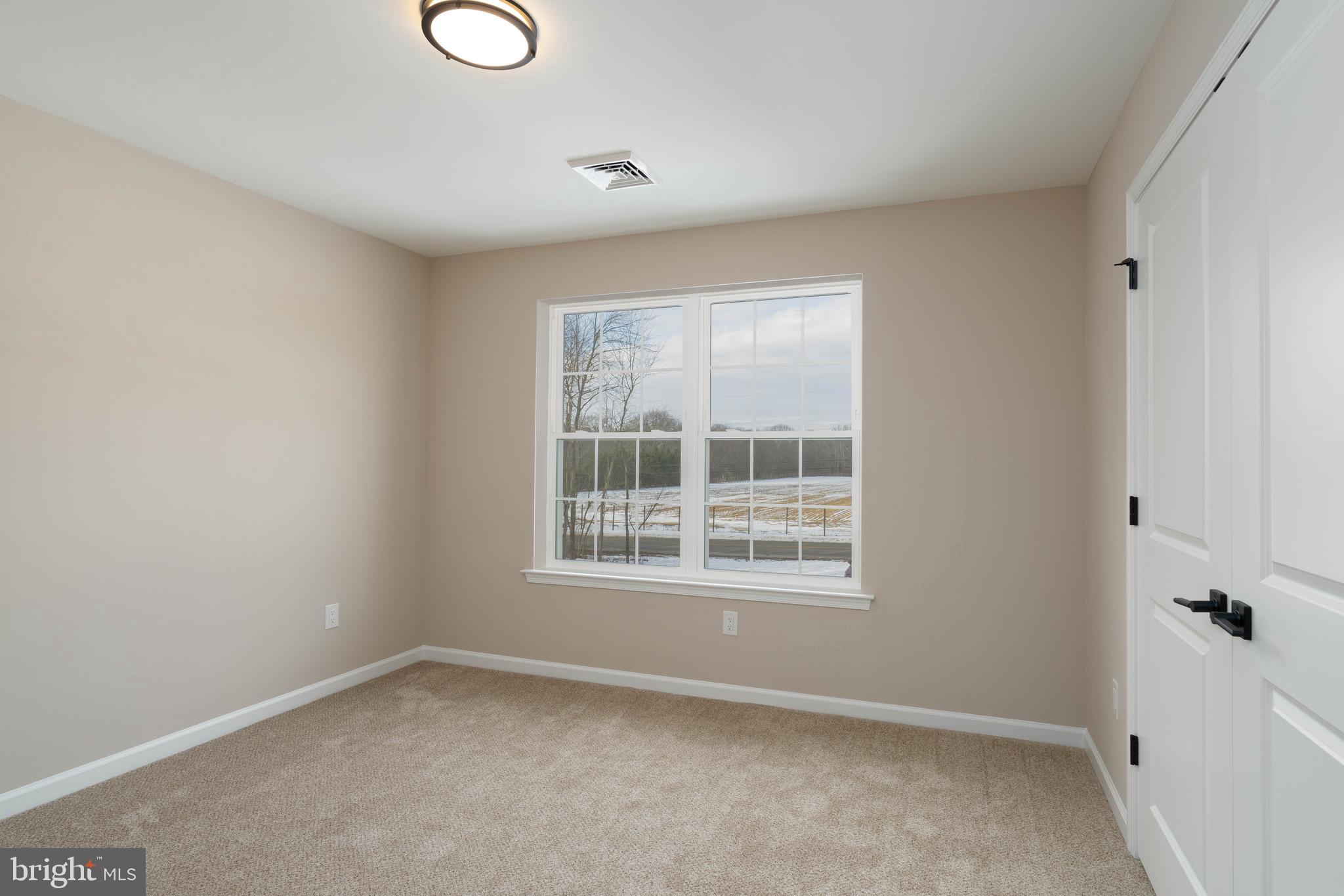 1162 South Spring Road Vineland, NJ 08361 - Photo 38 of 57 an empty room with a window