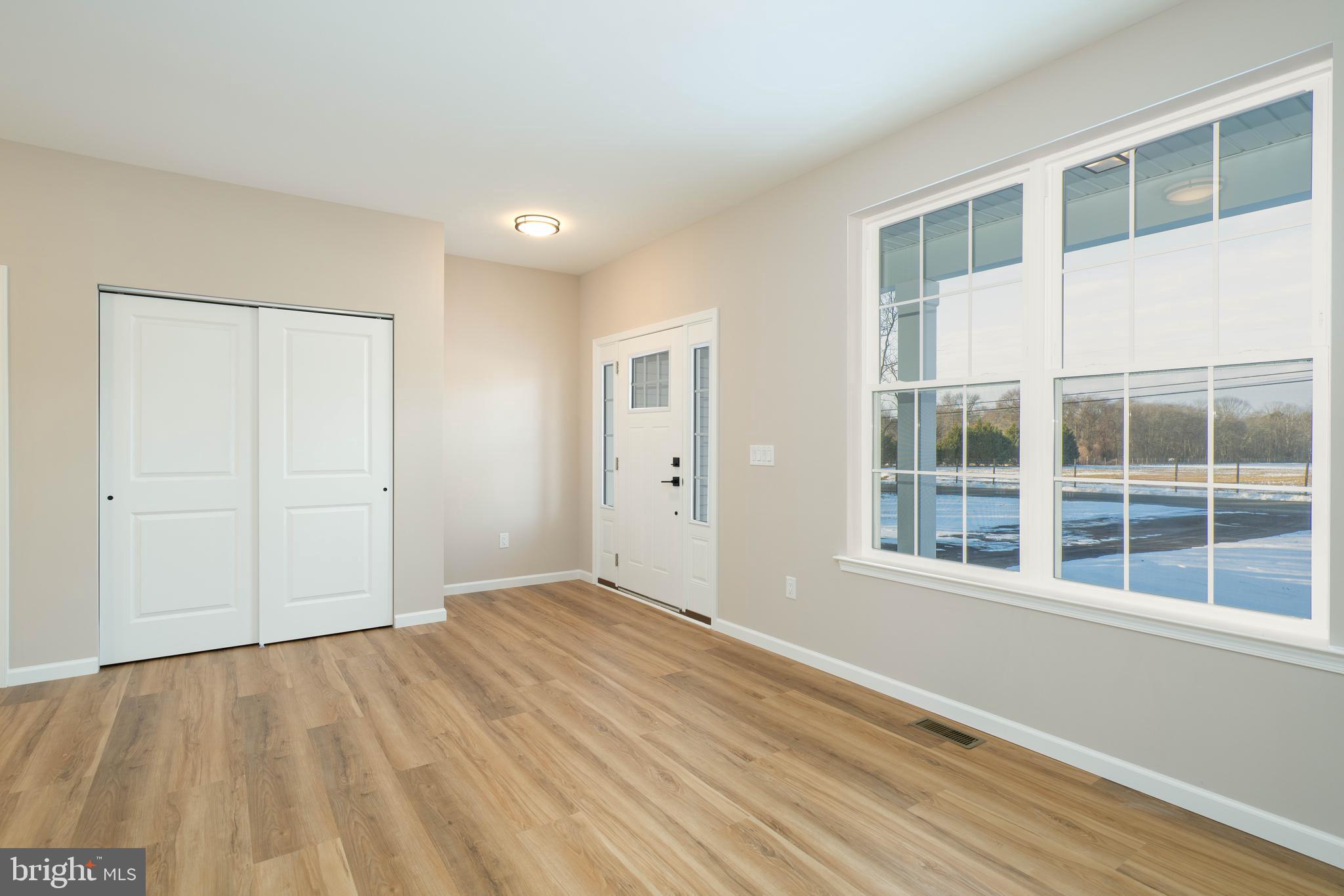1162 South Spring Road Vineland, NJ 08361 - Photo 9 of 57 a view of an empty room with a window