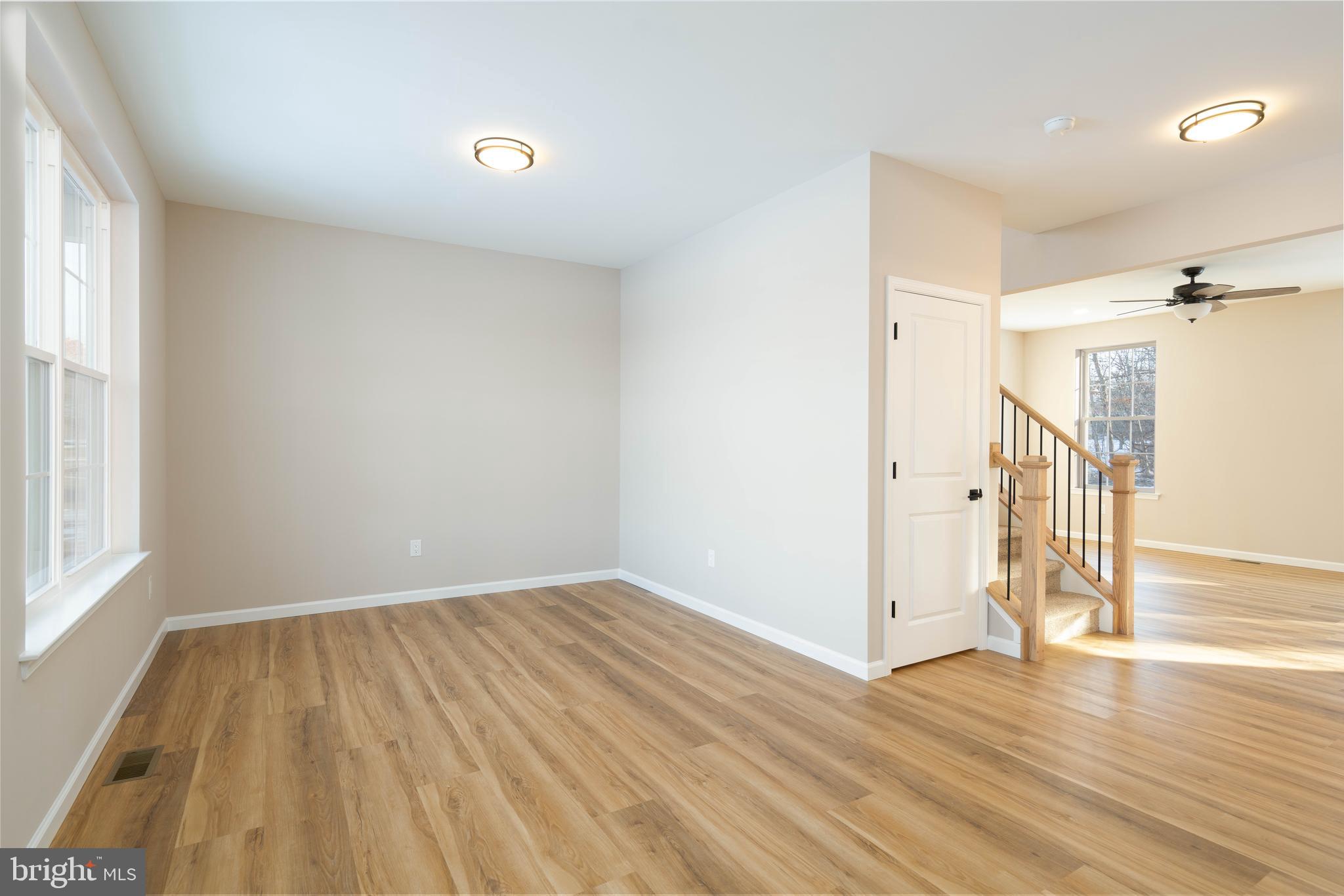 1162 South Spring Road Vineland, NJ 08361 - Photo 10 of 57 a view of a room with wooden floor and a window