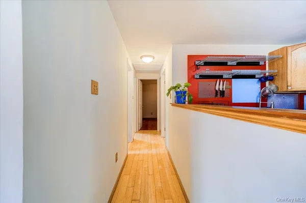 a view of a living room and bathroom