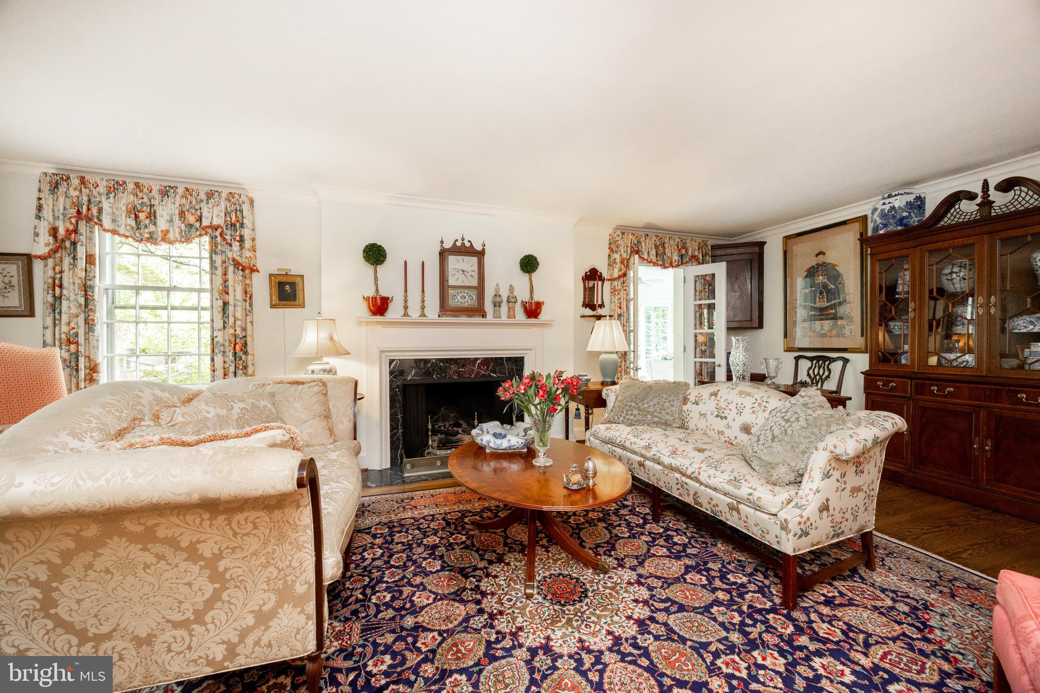 903 North Dupont Road Wilmington, DE 19807 - Photo 18 of 63 a living room with furniture a rug and a fireplace