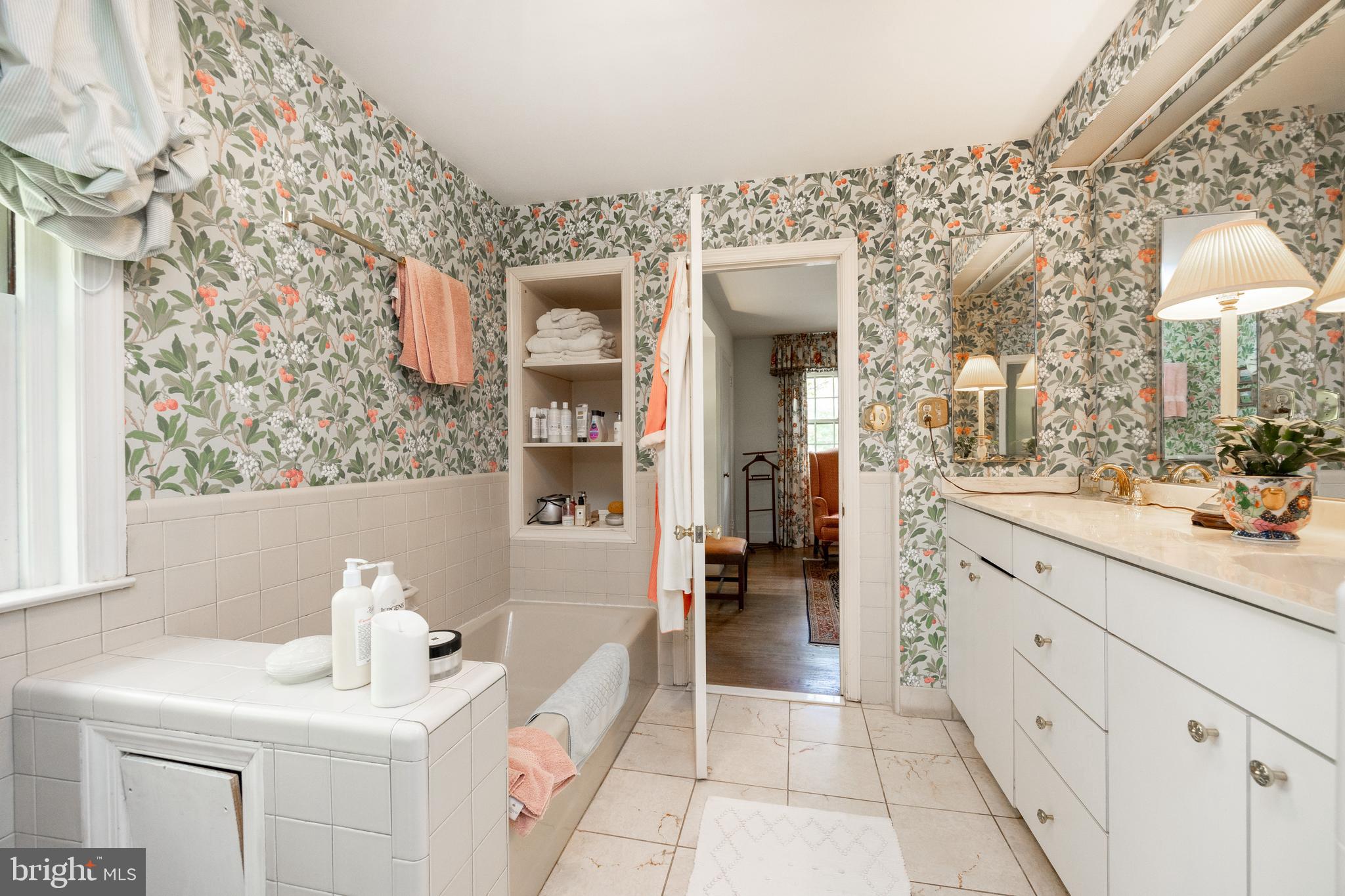 903 North Dupont Road Wilmington, DE 19807 - Photo 31 of 63 a bathroom with a sink and a mirror