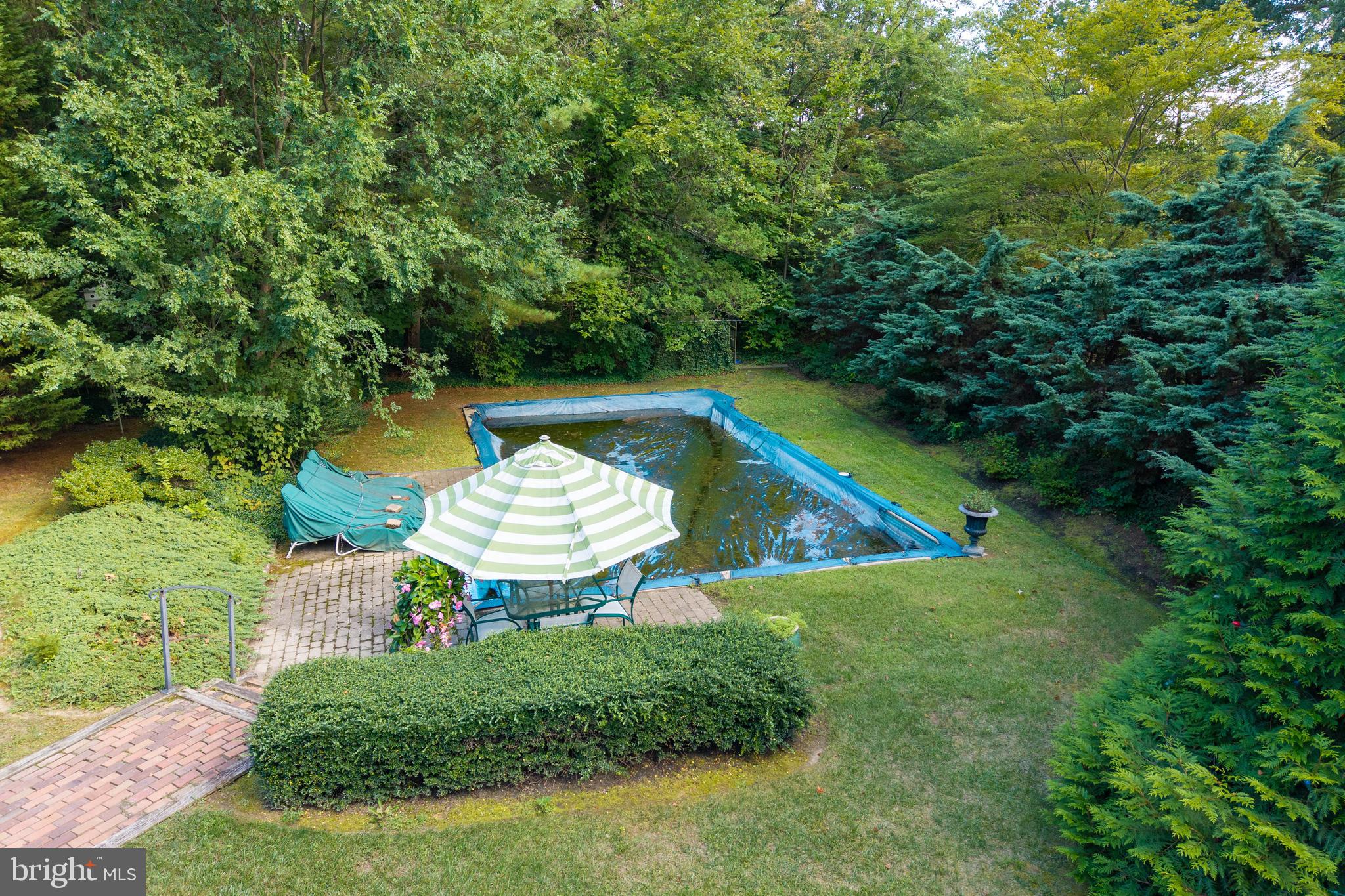 903 North Dupont Road Wilmington, DE 19807 - Photo 48 of 63 a view of a house with a backyard and swimming pool