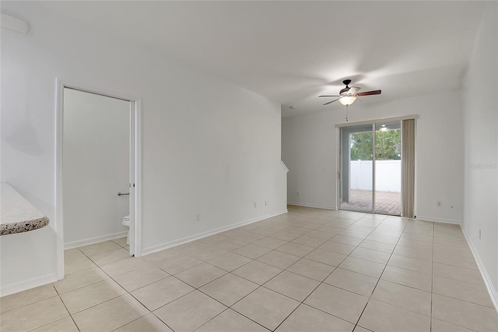 9161 Shepton Street Orlando, FL 32825 - Photo 15 of 62 a view of an empty room with a window