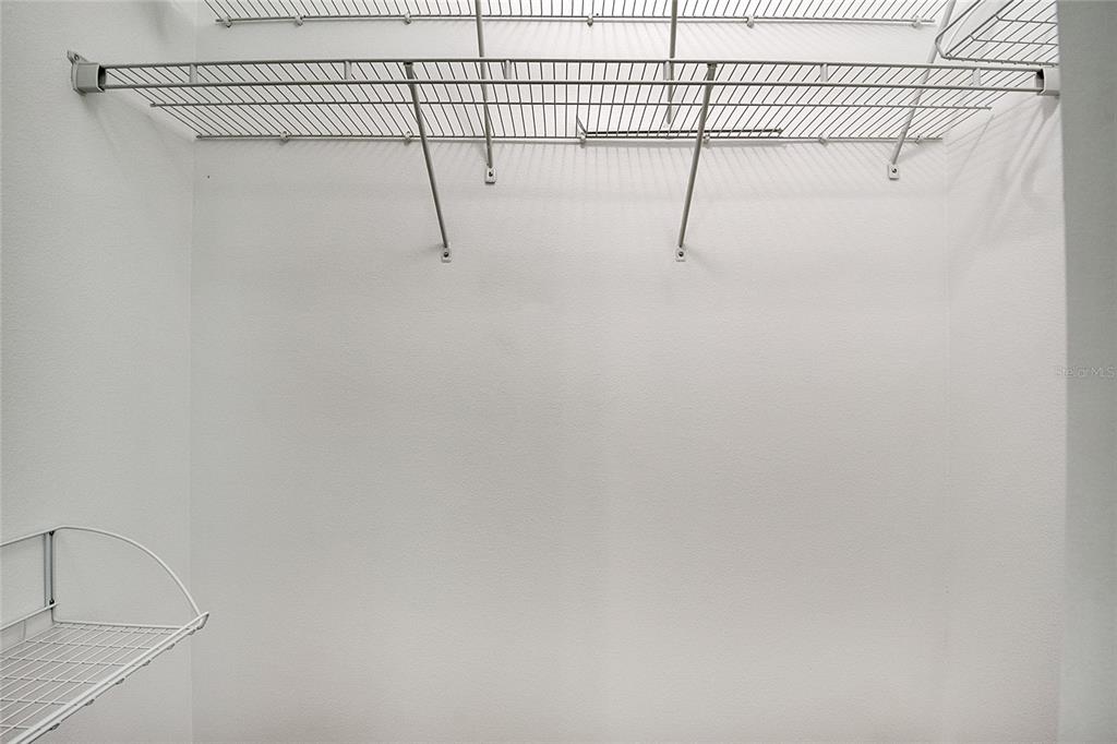 9161 Shepton Street Orlando, FL 32825 - Photo 27 of 62 a view of a room with racks on the wall