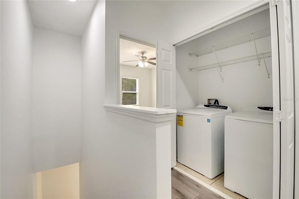 9161 Shepton Street Orlando, FL 32825 - Photo 30 of 62 a bathroom with a sink and a mirror