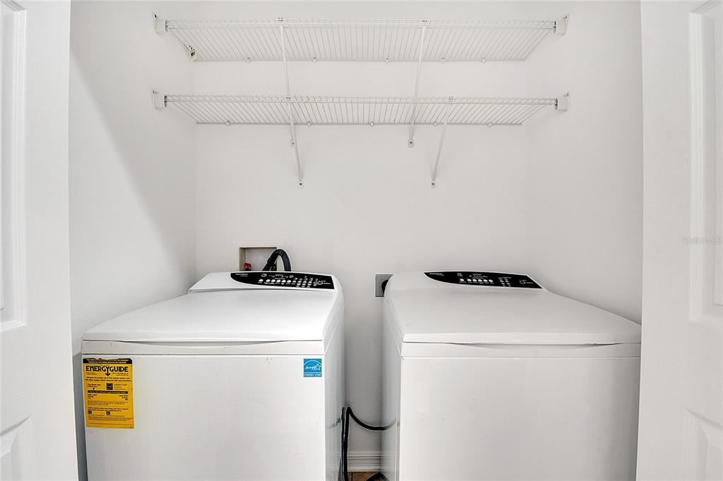 9161 Shepton Street Orlando, FL 32825 - Photo 31 of 62 a utility room with dryer and washer