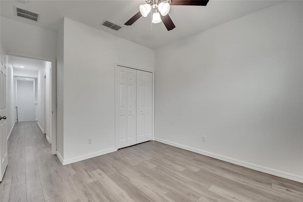9161 Shepton Street Orlando, FL 32825 - Photo 40 of 62 wooden floor in an empty room