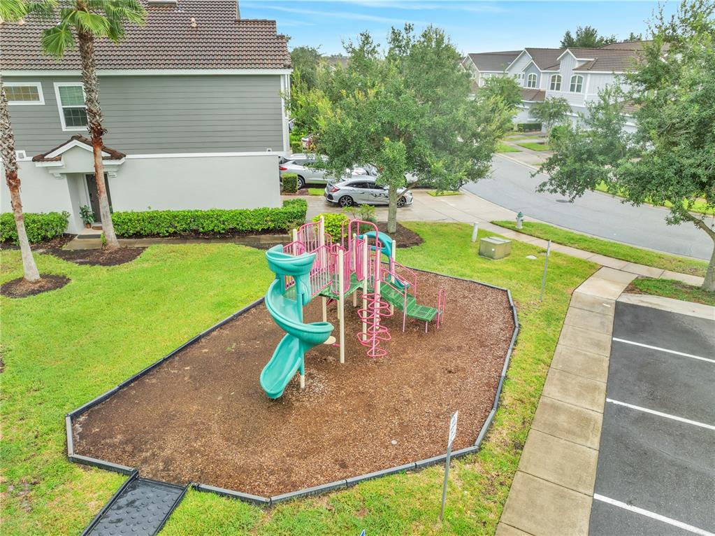 9161 Shepton Street Orlando, FL 32825 - Photo 56 of 62 a view of a backyard with fountain