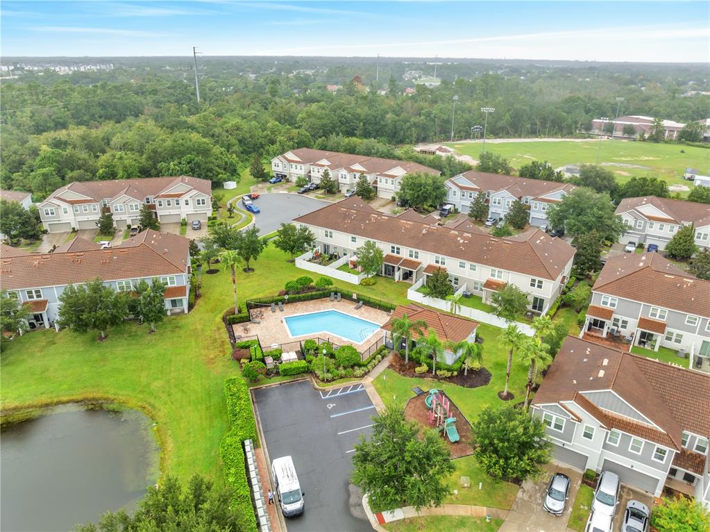 9161 Shepton Street Orlando, FL 32825 - Photo 58 of 62 an aerial view of residential houses with outdoor space and street view