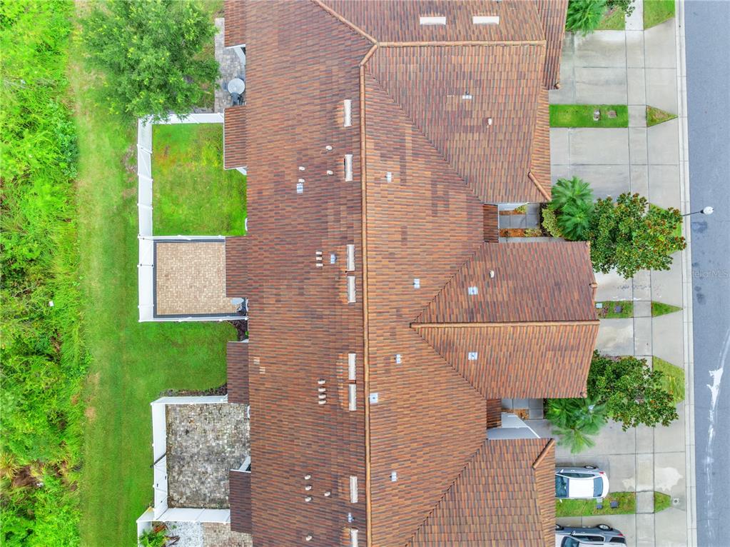 9161 Shepton Street Orlando, FL 32825 - Photo 62 of 62 a view of a brick wall in front of a house