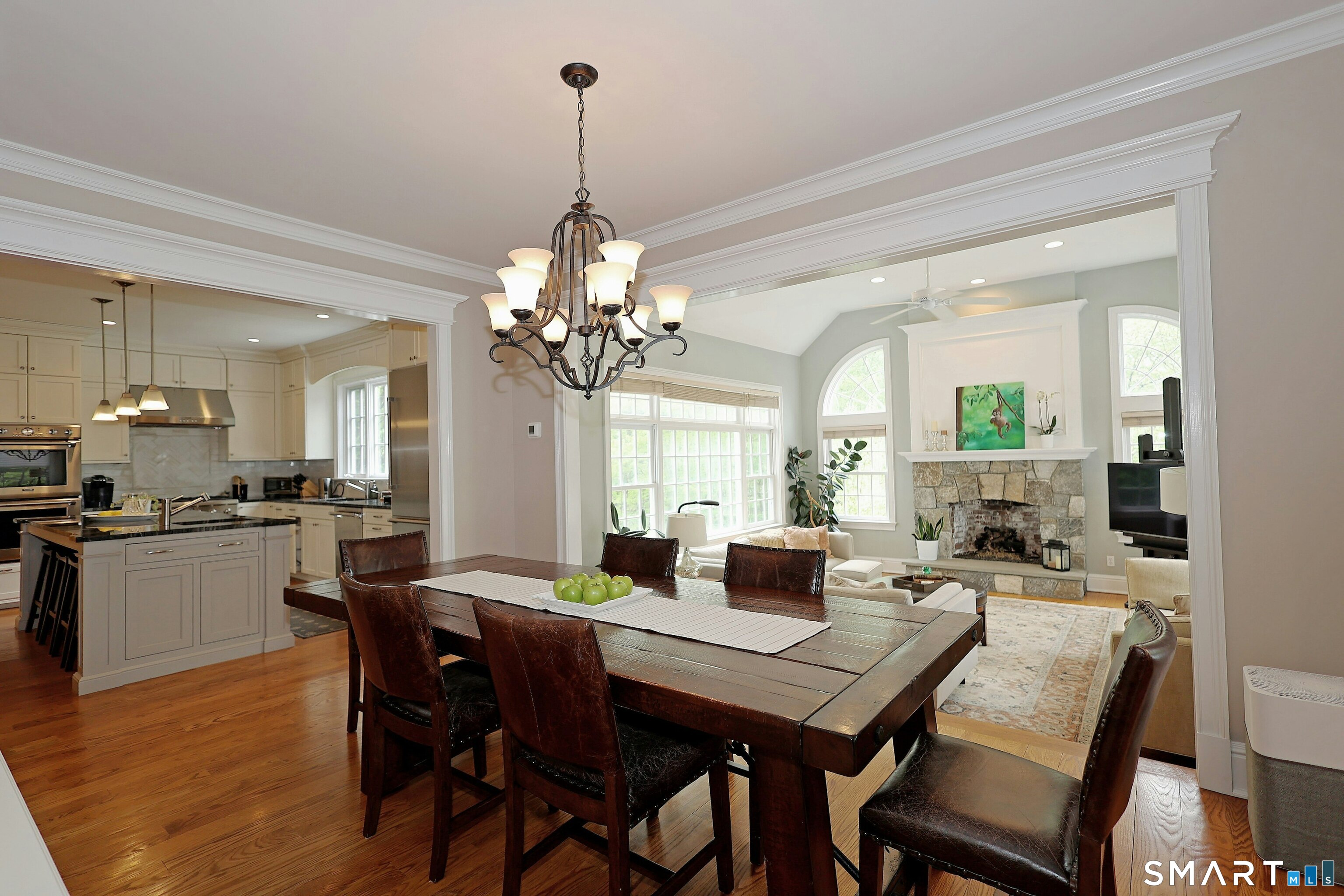 30 Whipstick Road Ridgefield, CT 06877 - Photo 20 of 40 a view of a dining room and chandelier