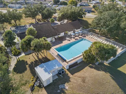 an aerial view of a house having yard