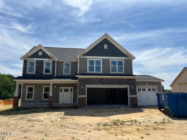 169 Big Pine Road Clayton, NC 27520 - Photo 1 of 14 a front view of a house with a yard