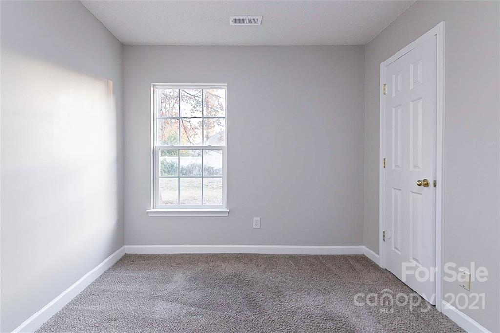 1216 Winding Path Road Clover, SC 29710 - Photo 12 of 15 a view of an empty room with a window