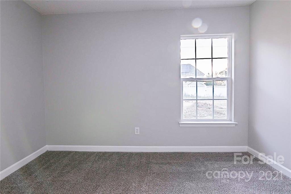 1216 Winding Path Road Clover, SC 29710 - Photo 14 of 15 an empty room with windows