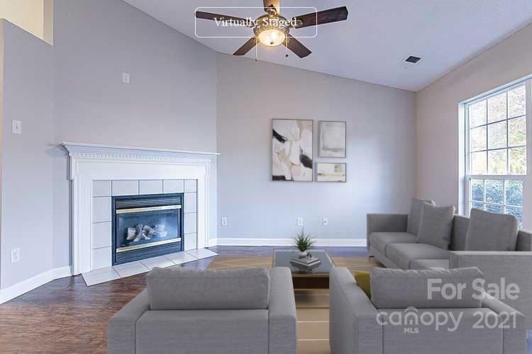 1216 Winding Path Road Clover, SC 29710 - Photo 2 of 15 a living room with furniture and a fireplace