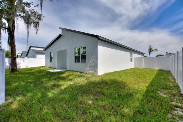 a house view with a garden space