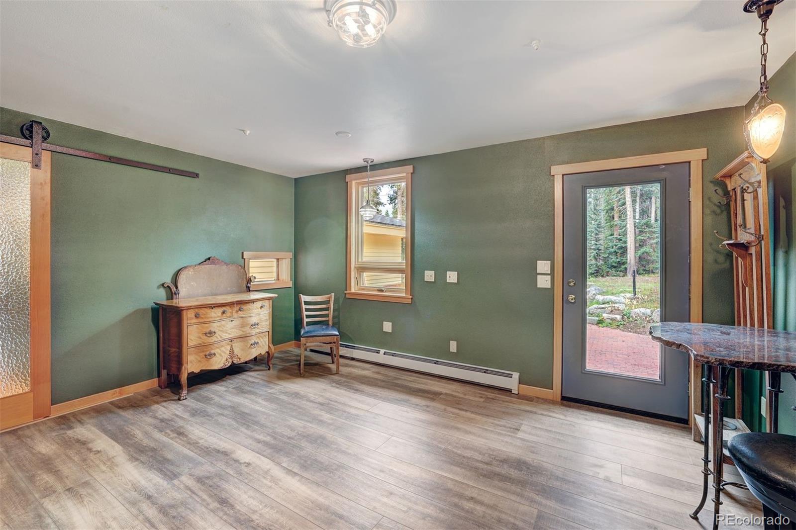 644 Spruce Creek Road Breckenridge, CO 80424 - Photo 19 of 42 a view of a livingroom with furniture and windows
