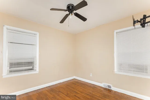 a bathroom with a sink toilet a mirror and shower