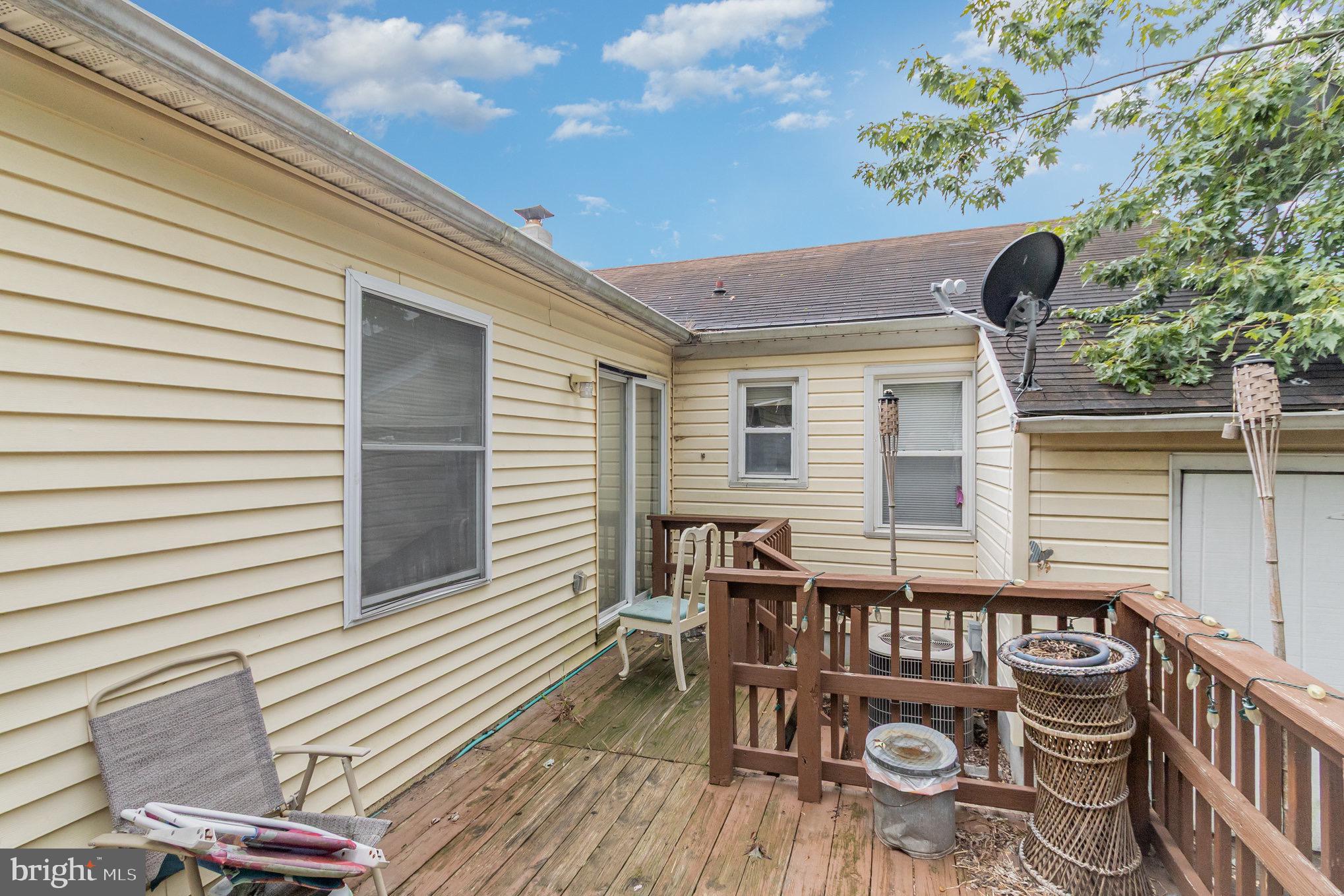 25 Mitchell Avenue Aberdeen, MD 21001 - Photo 20 of 26 a view of a chair and table in the balcony