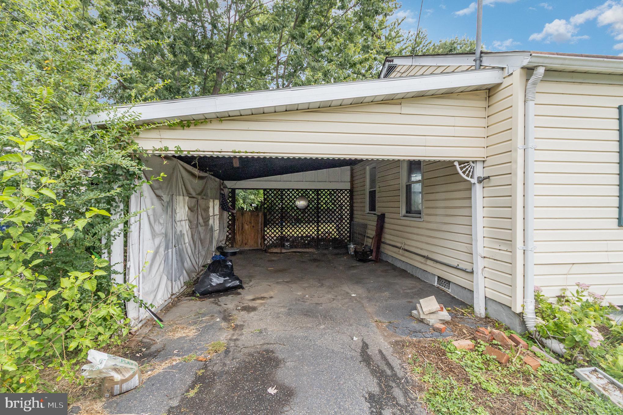 25 Mitchell Avenue Aberdeen, MD 21001 - Photo 24 of 26 a view of a small house with a canopy over it