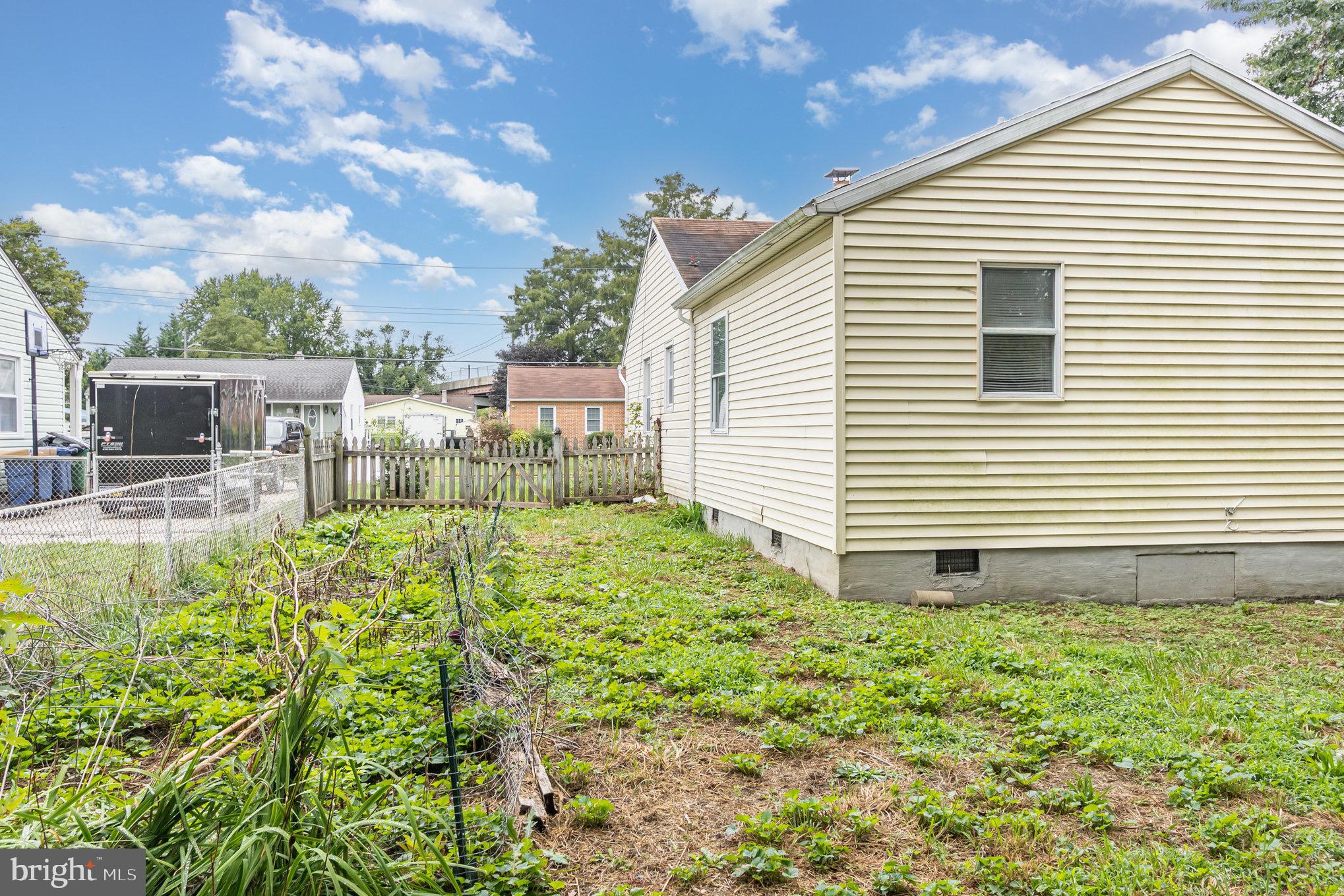 25 Mitchell Avenue Aberdeen, MD 21001 - Photo 26 of 26 a view of a backyard with plants and patio