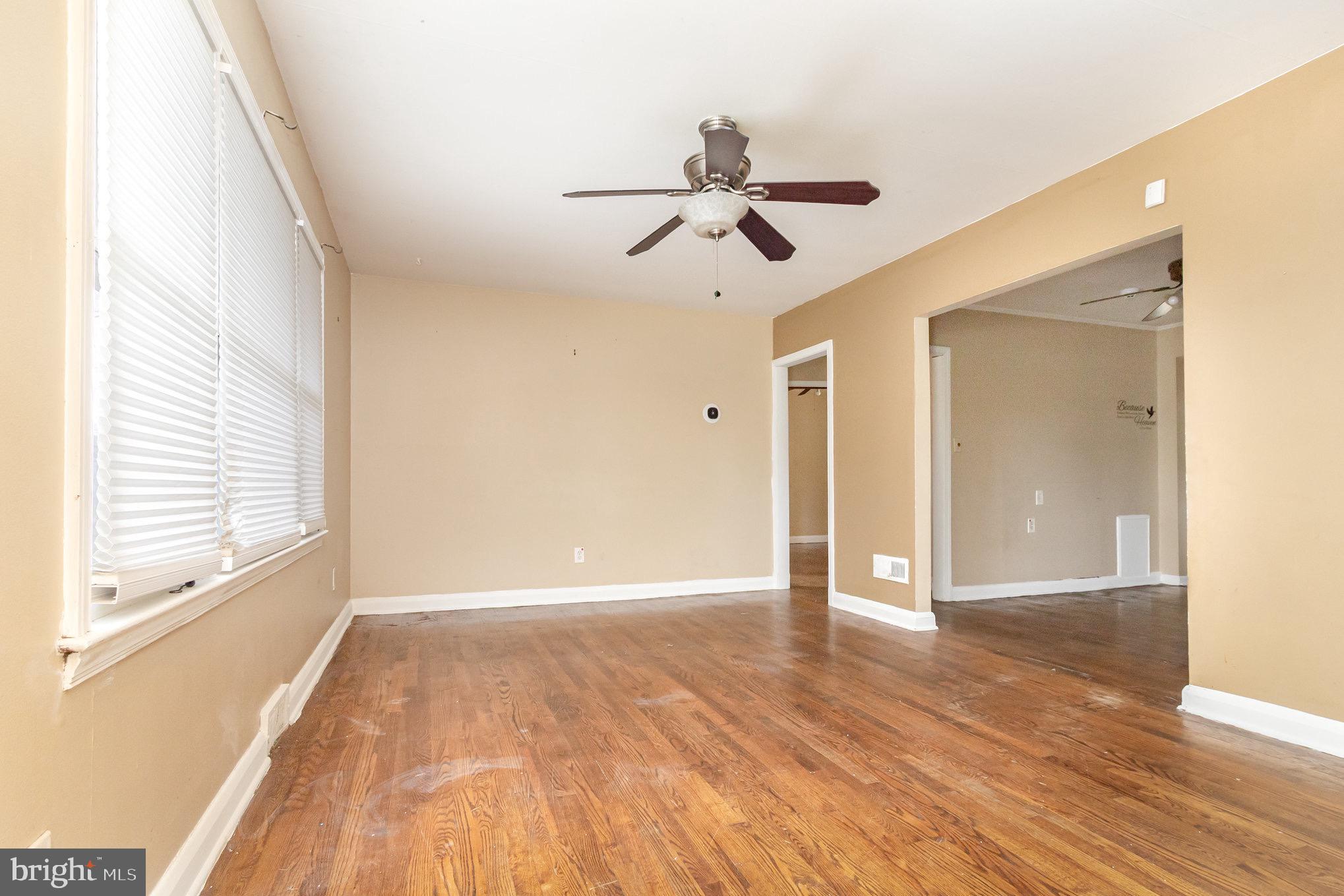 25 Mitchell Avenue Aberdeen, MD 21001 - Photo 8 of 26 a view of empty room with wooden floor and fan