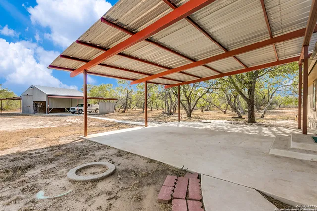 a view of a backyard of a house