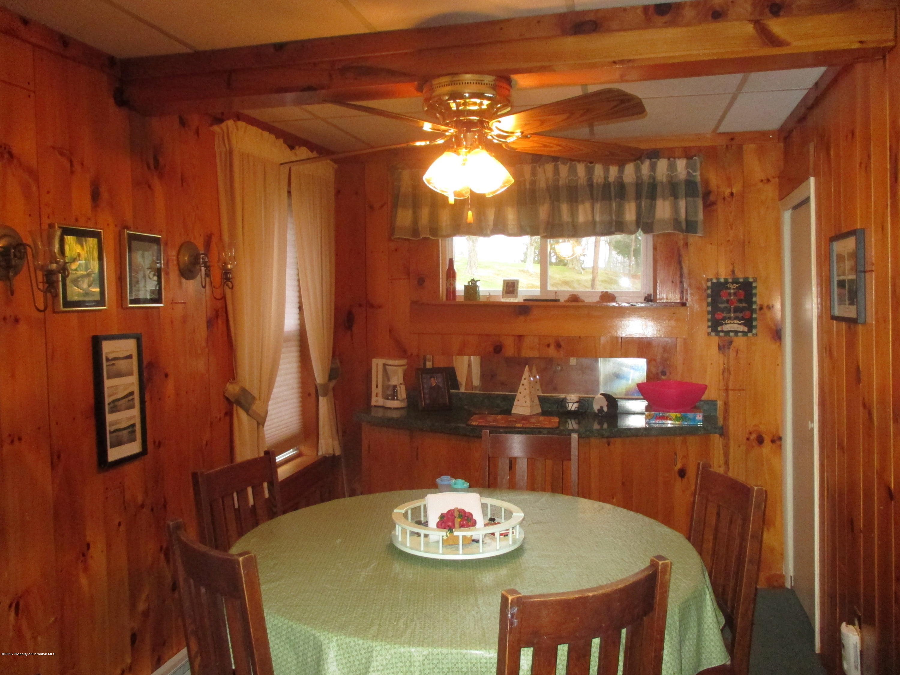 394 Point Road Lake Winola, PA 18419 - Photo 11 of 28 a dining room with furniture and window