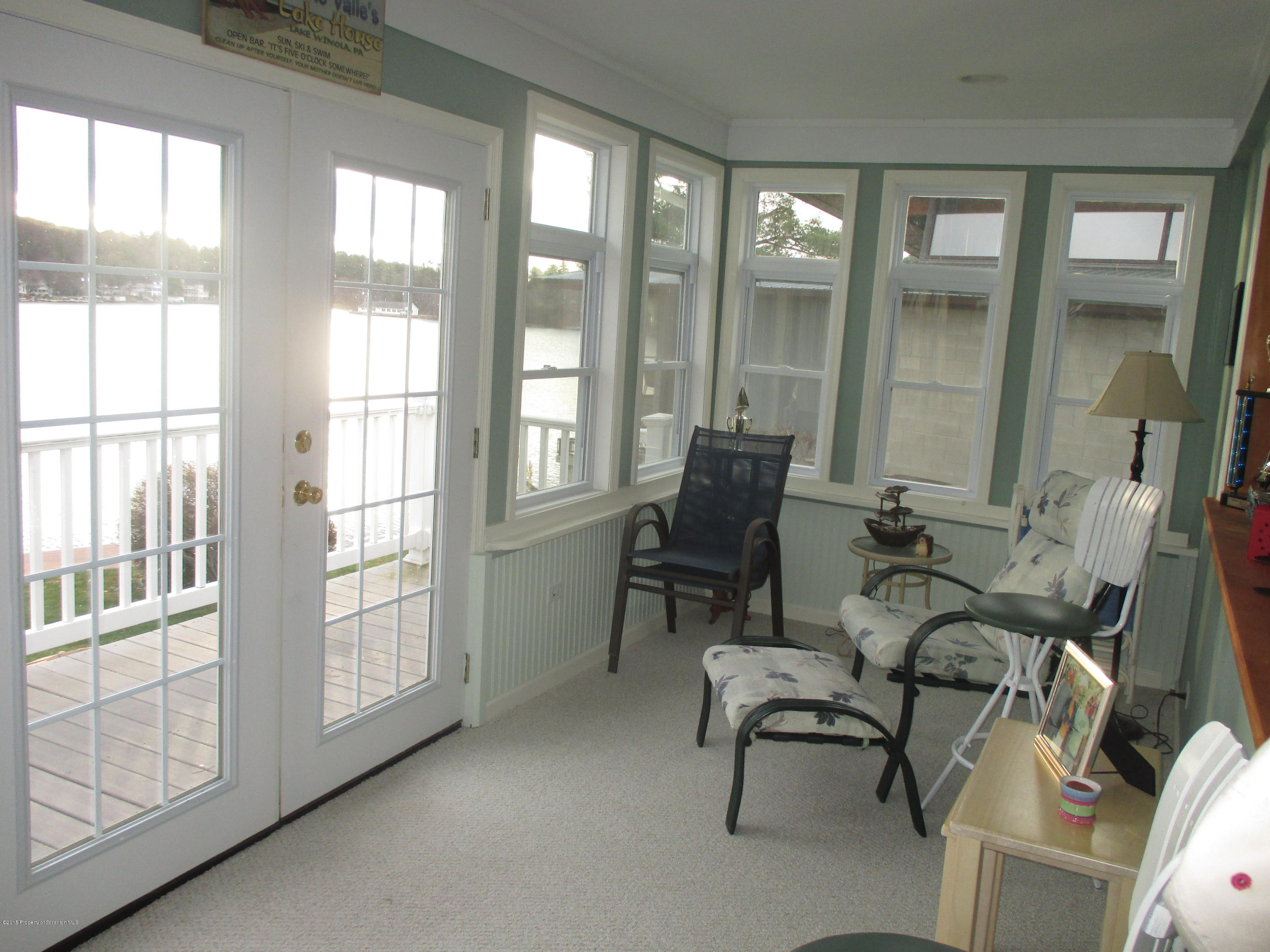 394 Point Road Lake Winola, PA 18419 - Photo 14 of 28 a view of a livingroom with furniture and windows