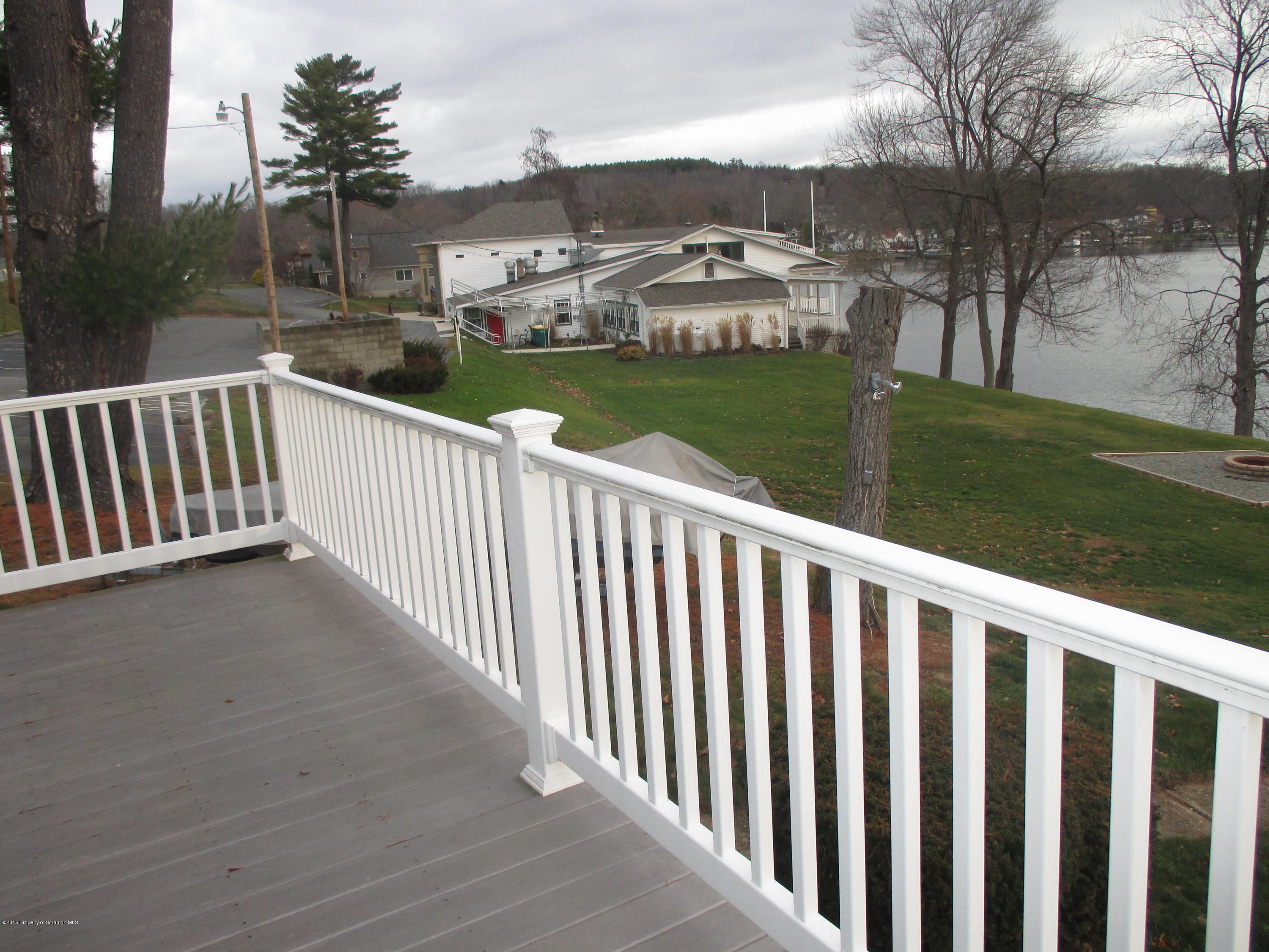 394 Point Road Lake Winola, PA 18419 - Photo 16 of 28 a view of a street with a garden
