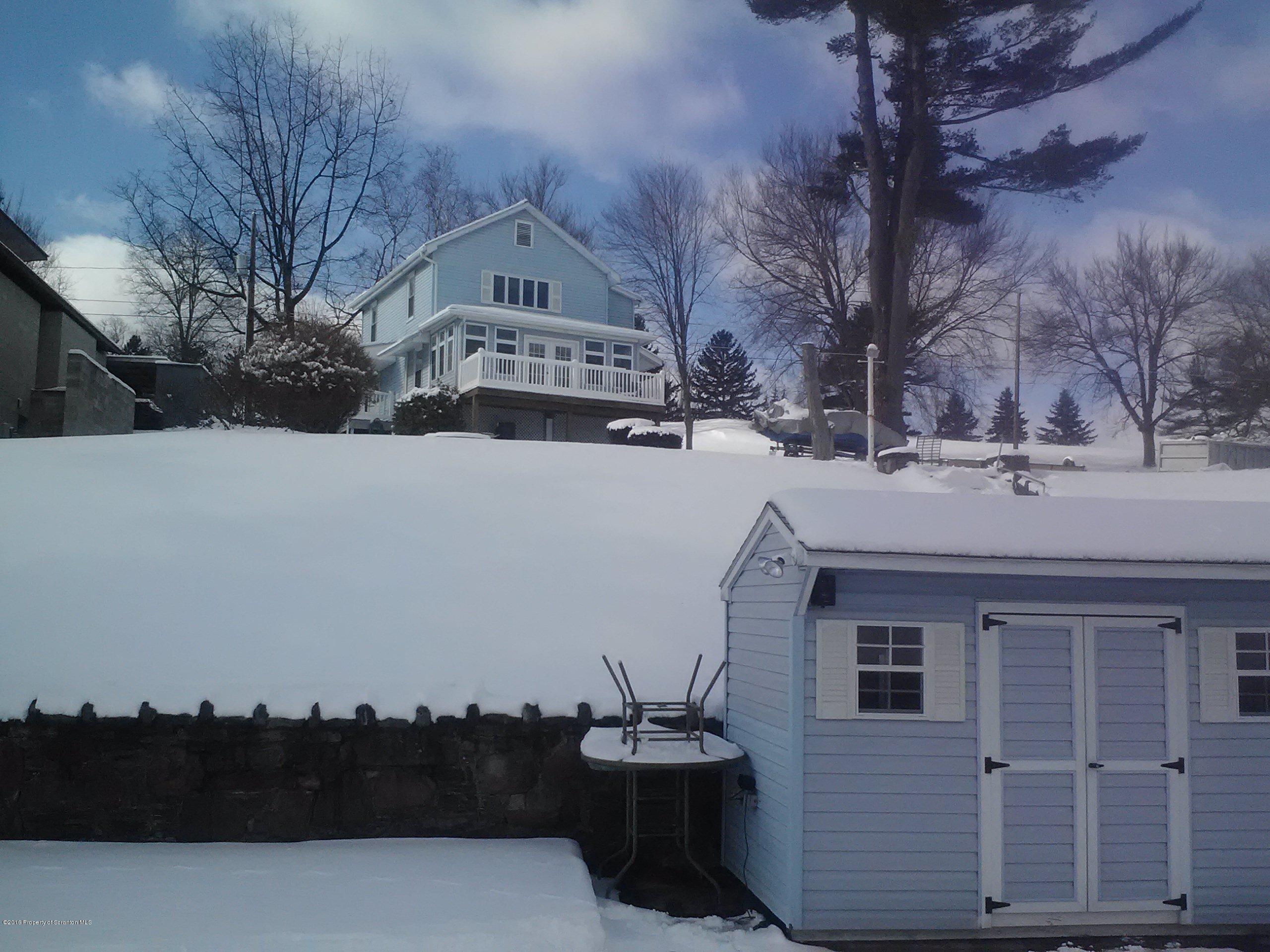 394 Point Road Lake Winola, PA 18419 - Photo 28 of 28 a view of a house with a yard