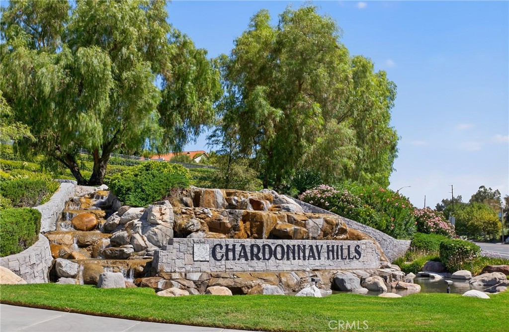 31928 Cercle Chambertin Temecula, CA 92591 - Photo 65 of 74 a front view of a house with garden