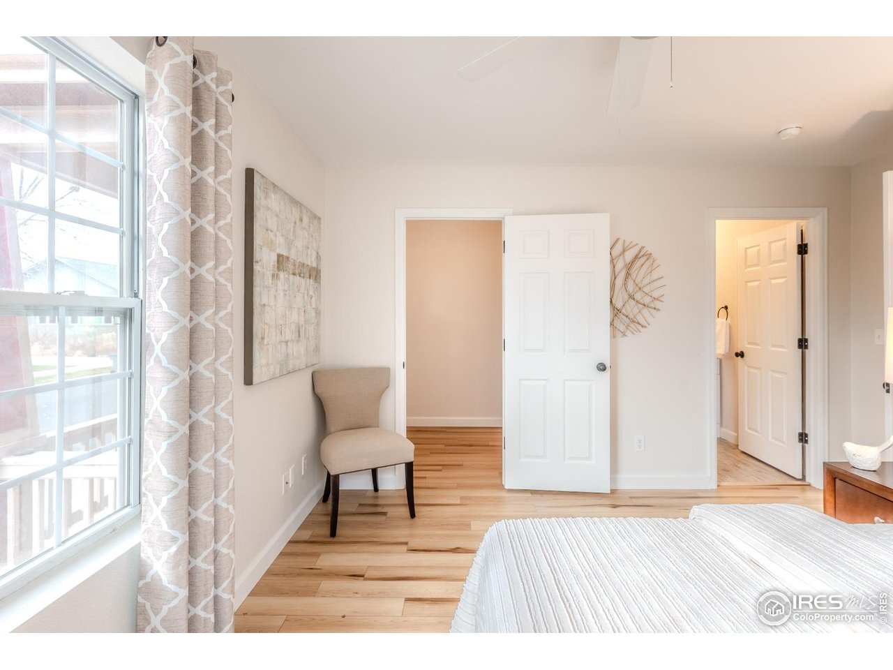 502 Ridge Avenue Longmont, CO 80501 - Photo 21 of 36 a living room with furniture and a rug