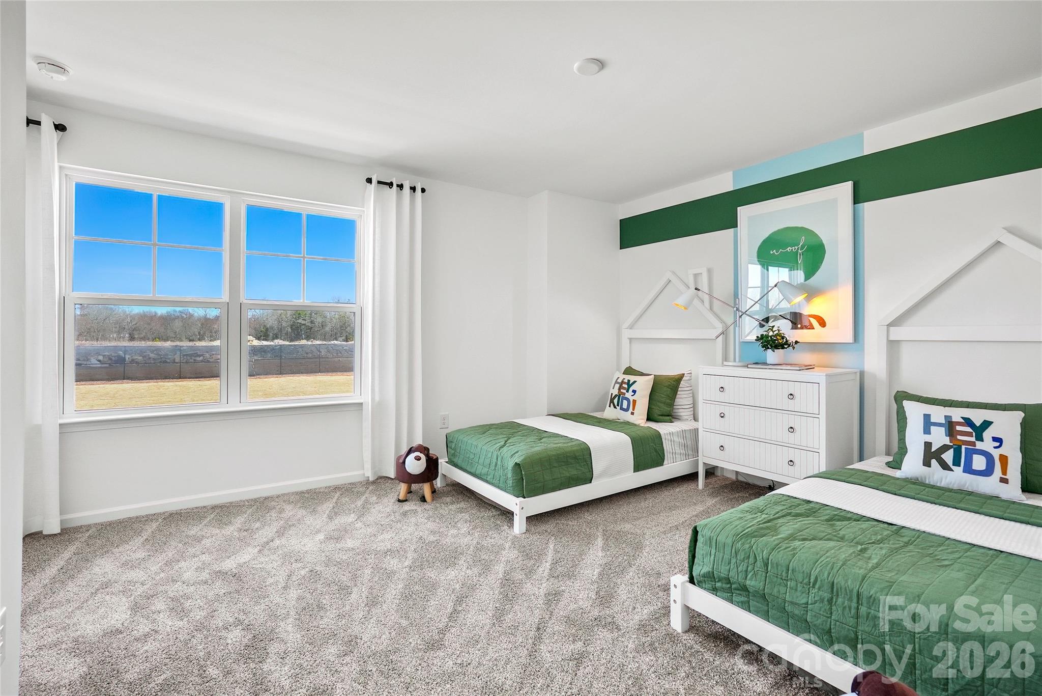 2168 Rone Branch Trail Monroe, NC 28110 - Photo 15 of 22 a spacious bedroom with a bed and a window