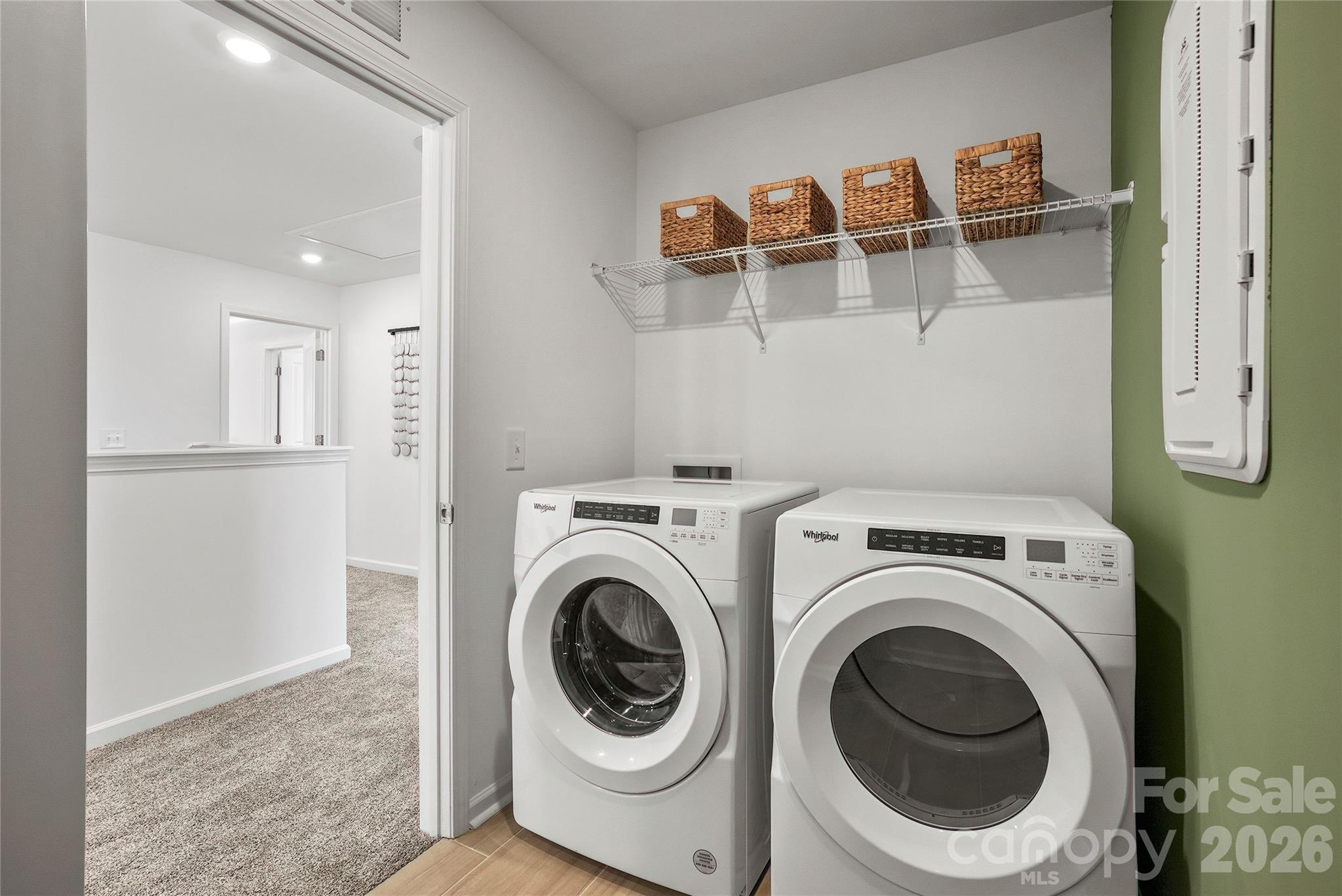 2168 Rone Branch Trail Monroe, NC 28110 - Photo 16 of 22 a utility room with dryer and washer