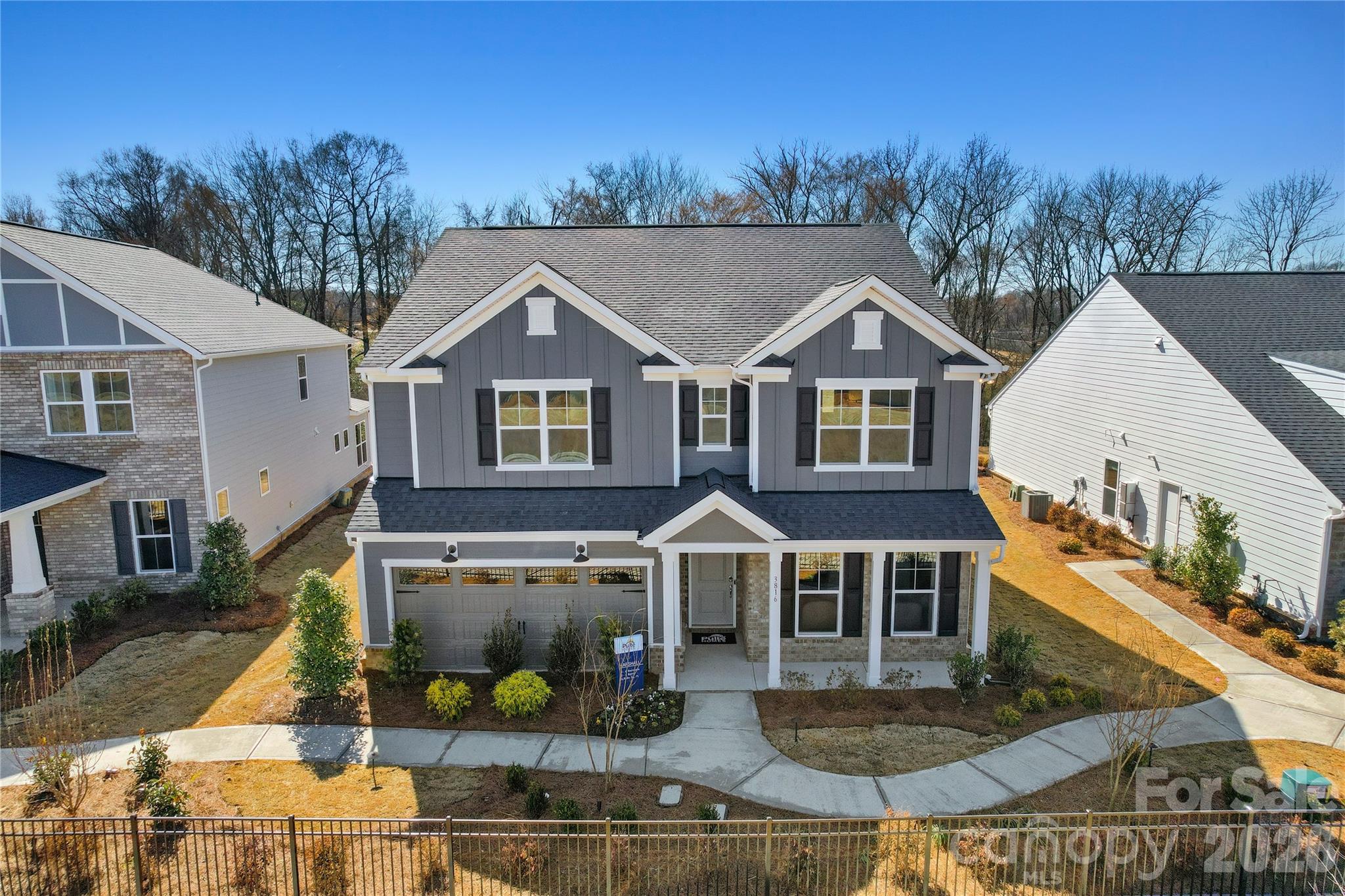 2168 Rone Branch Trail Monroe, NC 28110 - Photo 2 of 22 a front view of a house with garden