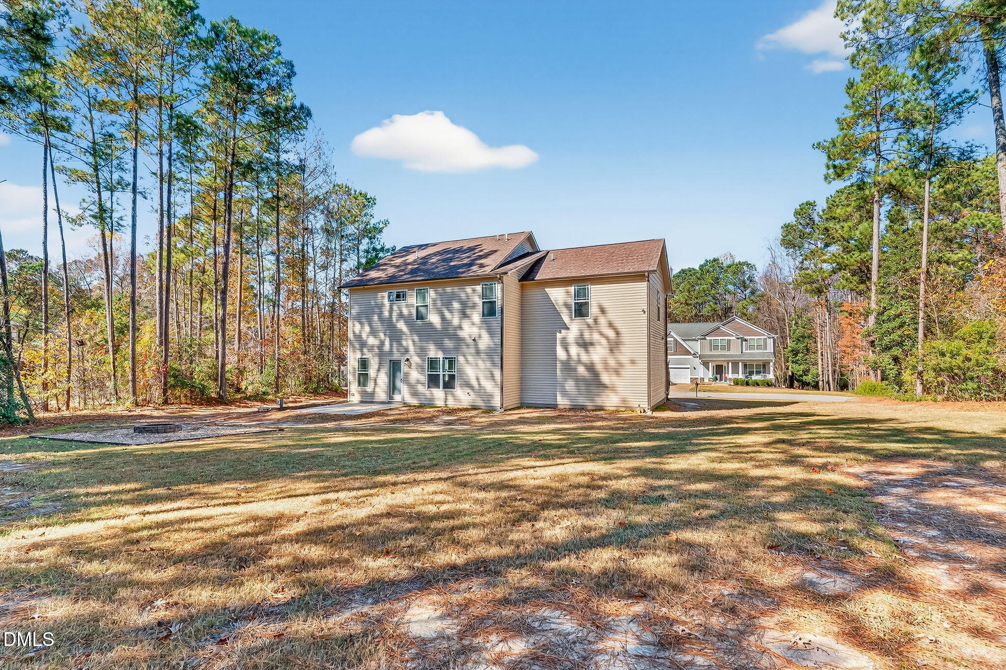 118 Landlocked Circle Angier, NC 27501 - Photo 23 of 27 a view of a house with a yard and a garage