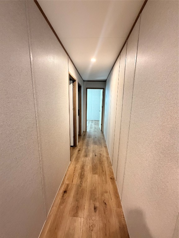 4782 Fm 1010 Road Cleveland, TX 77327 - Photo 6 of 16 a view of hallway with wooden floor
