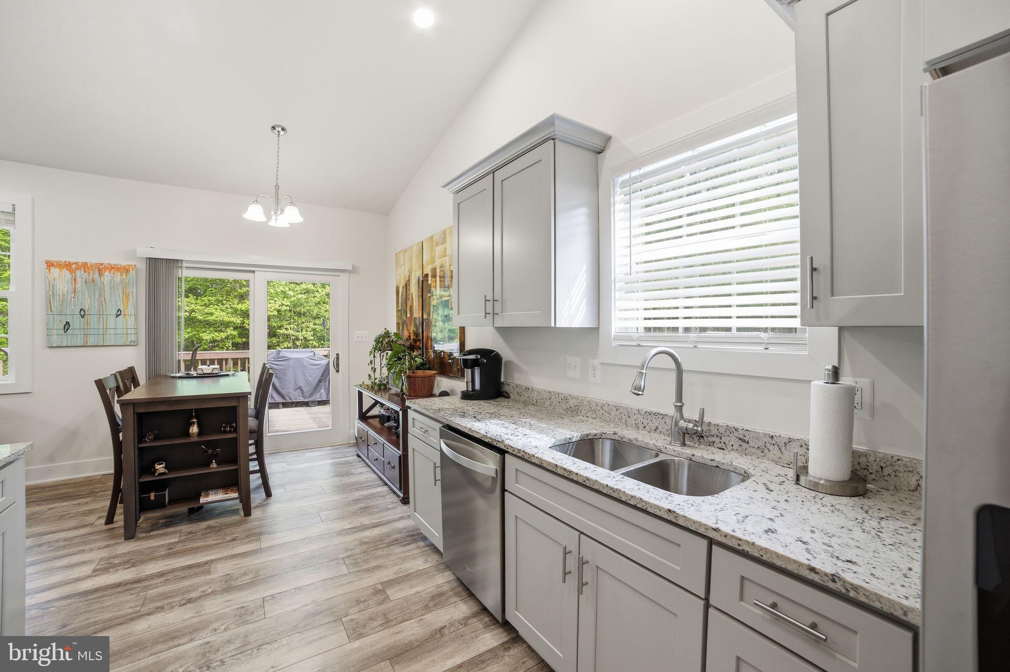 329 North Glebe Road Montross, VA 22520 - Photo 11 of 39 a kitchen with a sink stove and cabinets