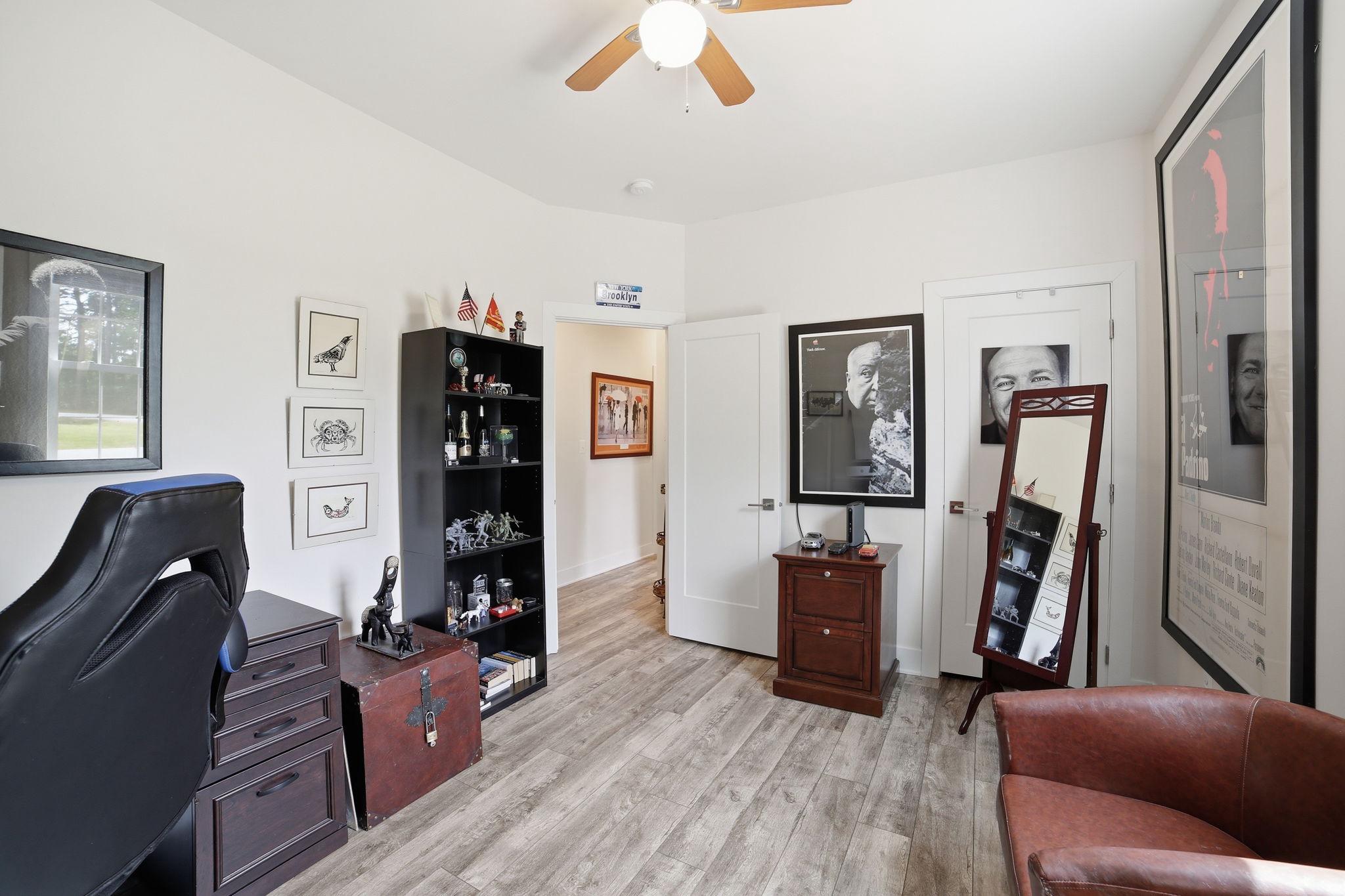 329 North Glebe Road Montross, VA 22520 - Photo 20 of 39 a living room with furniture and a flat screen tv