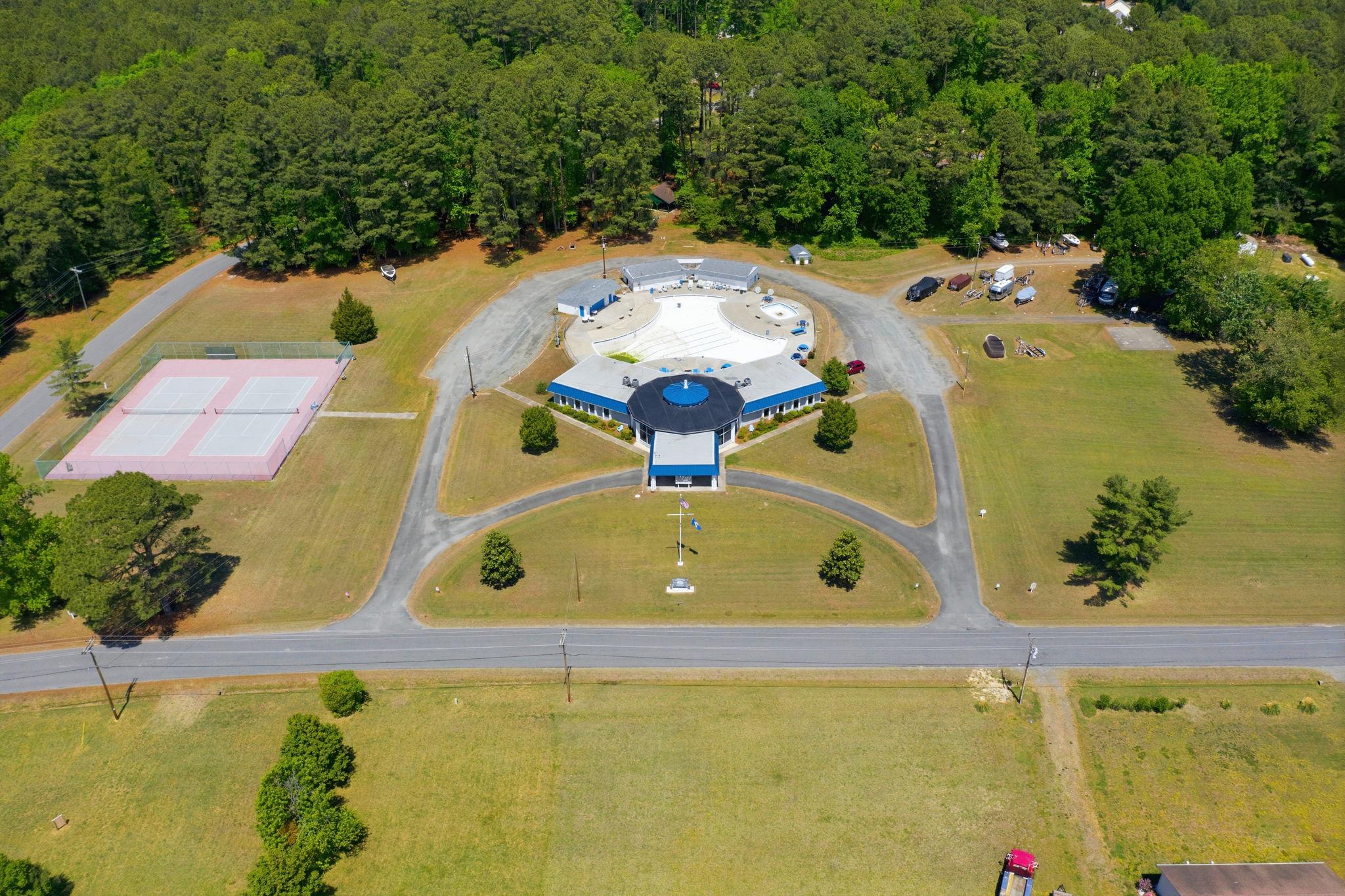 329 North Glebe Road Montross, VA 22520 - Photo 29 of 39 an aerial view of a house with a swimming pool