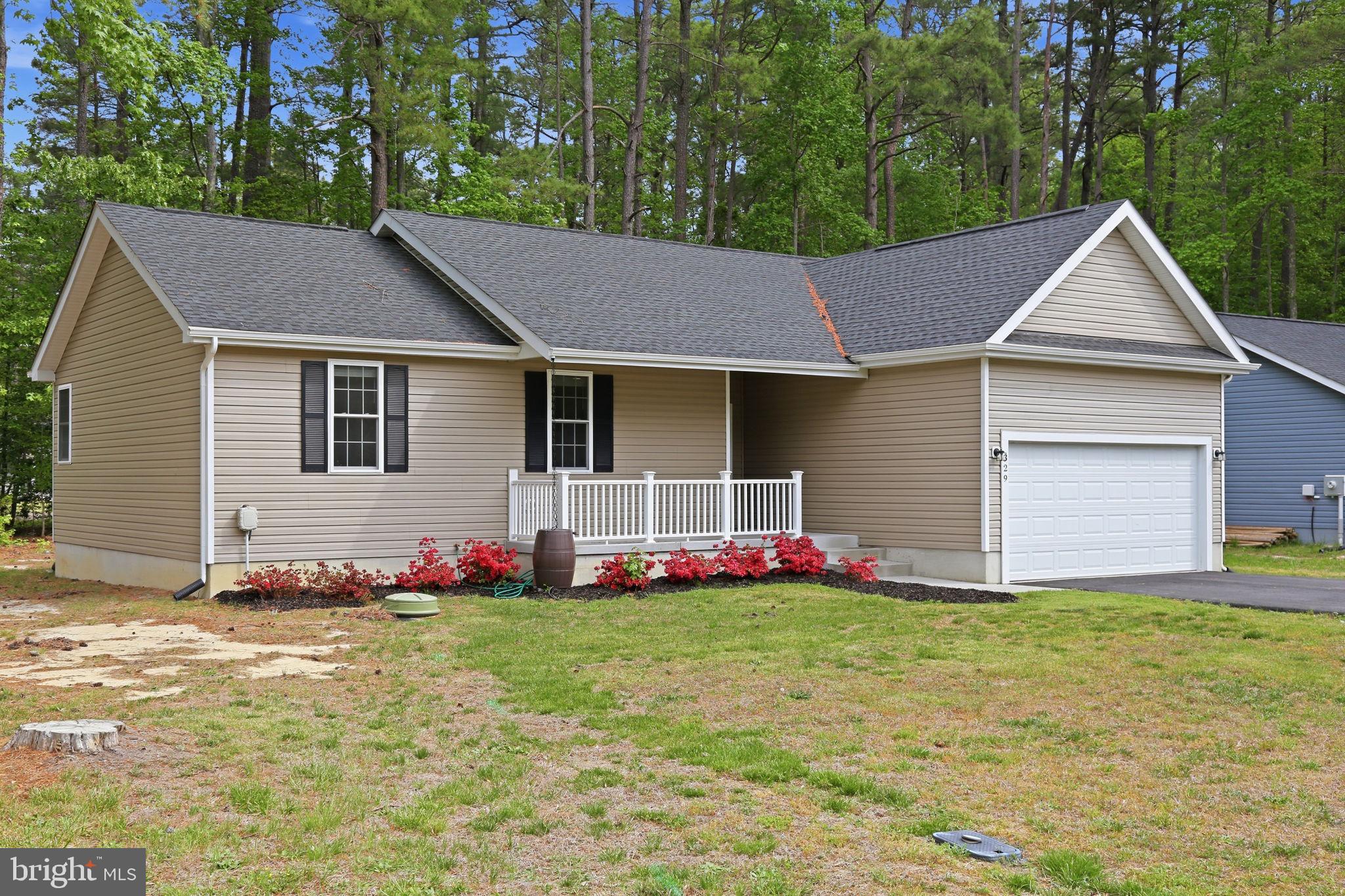 329 North Glebe Road Montross, VA 22520 - Photo 32 of 39 a front view of house with yard and green space