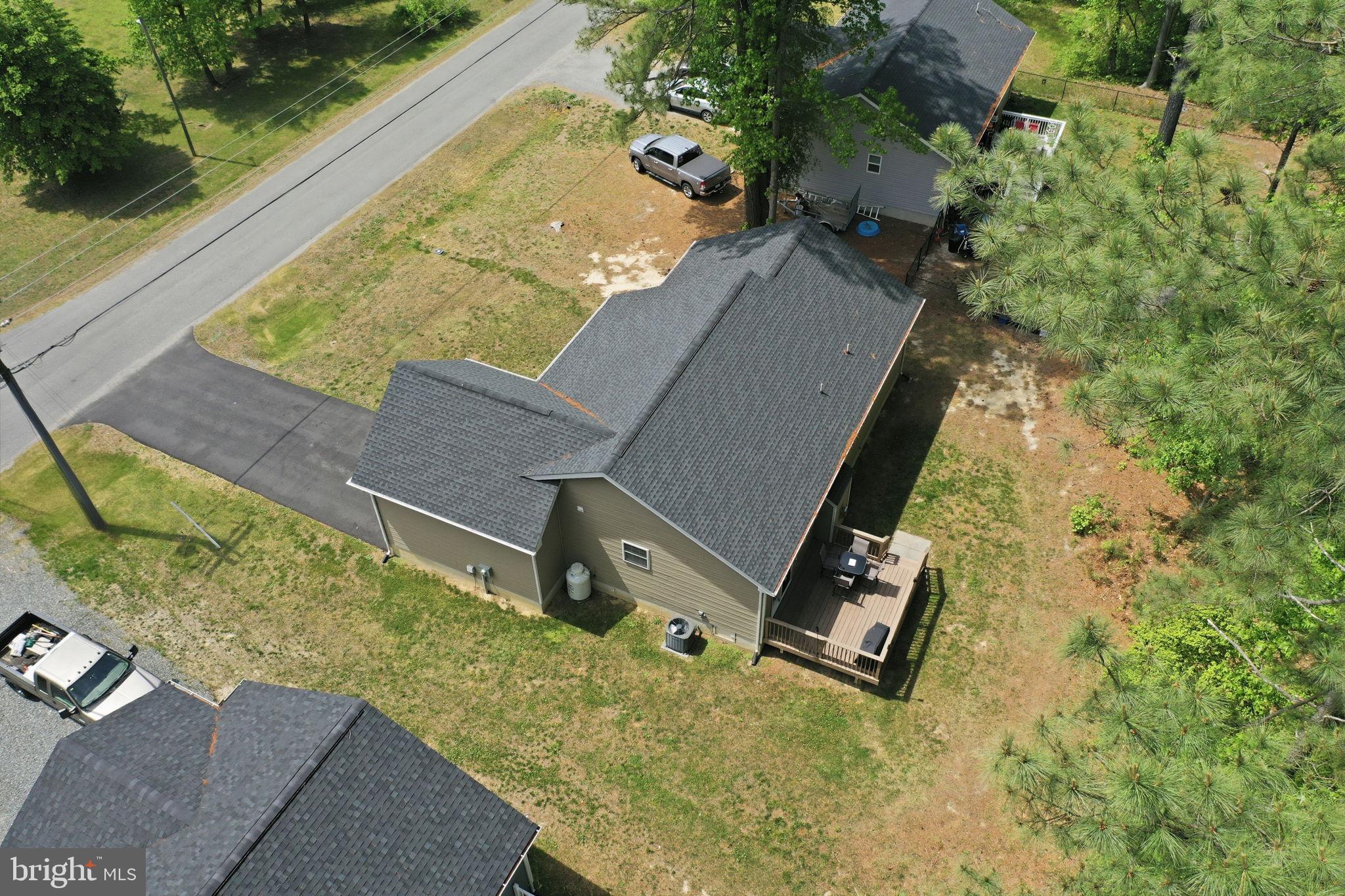 329 North Glebe Road Montross, VA 22520 - Photo 36 of 39 an aerial view of a house with a yard and lake view