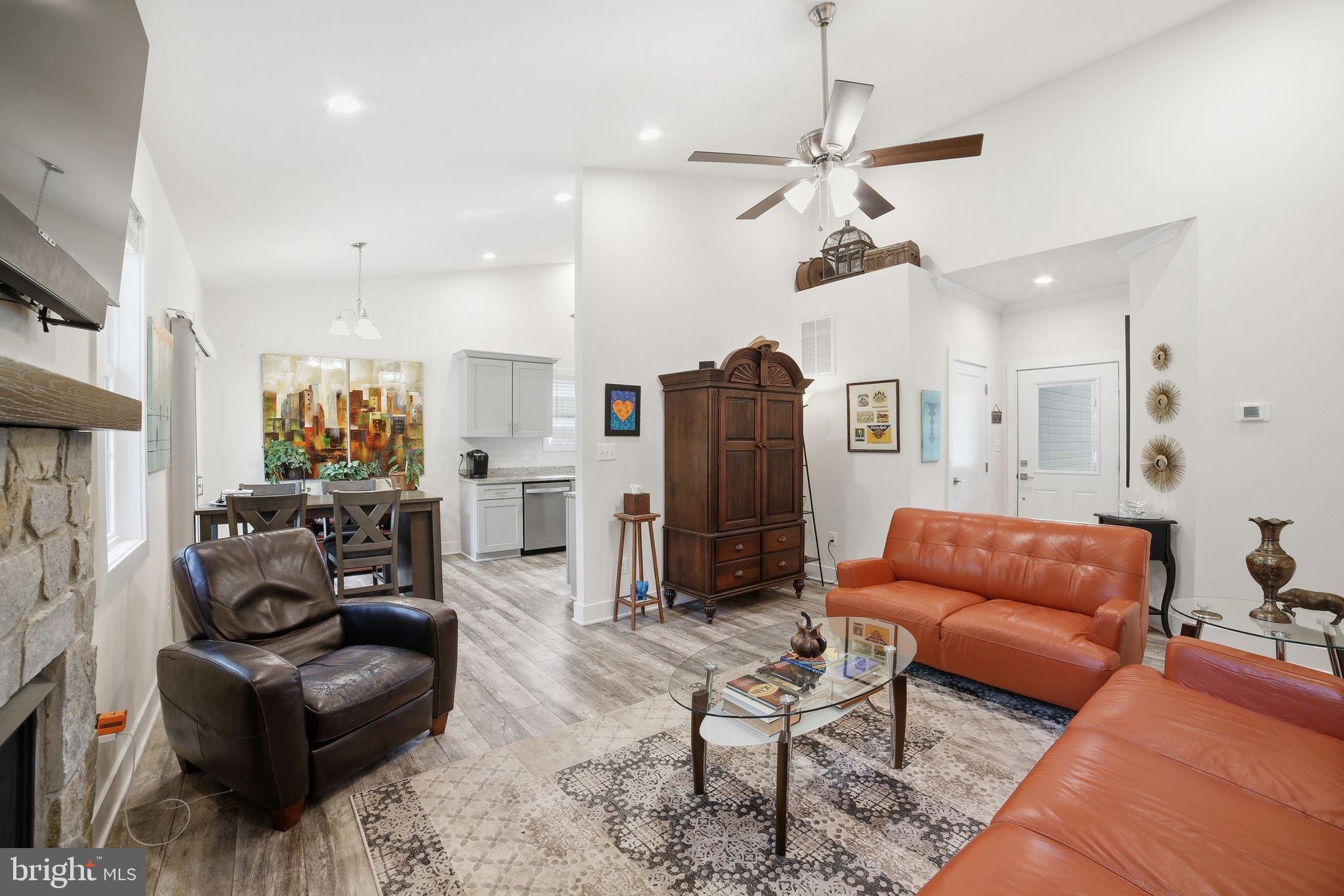 329 North Glebe Road Montross, VA 22520 - Photo 6 of 39 a living room with furniture kitchen view and a chandelier