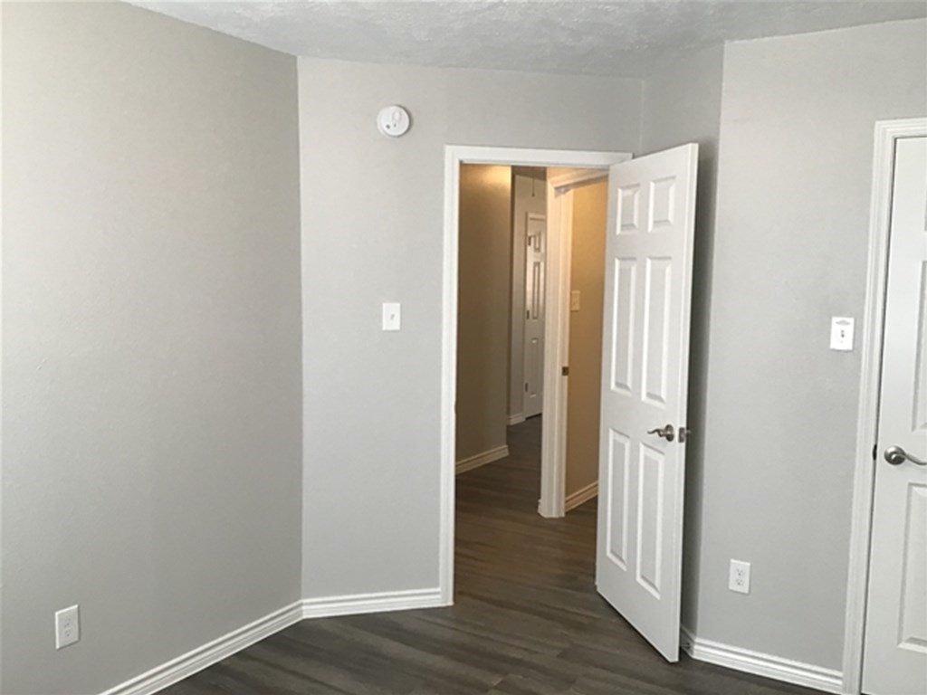5026 Chase Stone Drive Bacliff, TX 77518 - Photo 8 of 18 a view of a bathroom with wooden floor